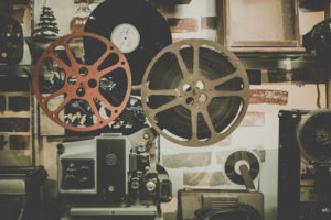 Film reels attached to a projector